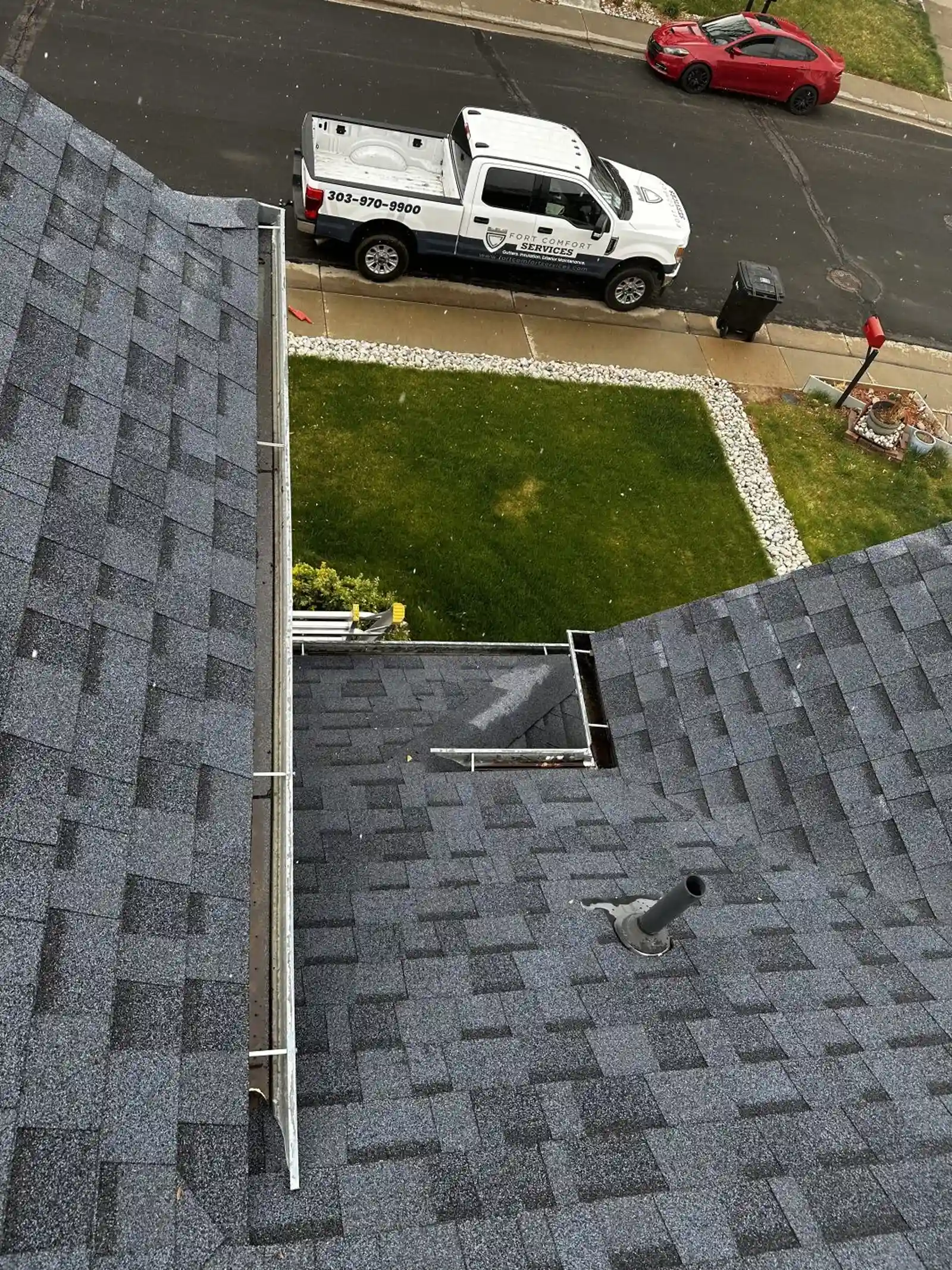 Fort Comfort Gutters truck parked outside a home for a professional gutter cleaning.